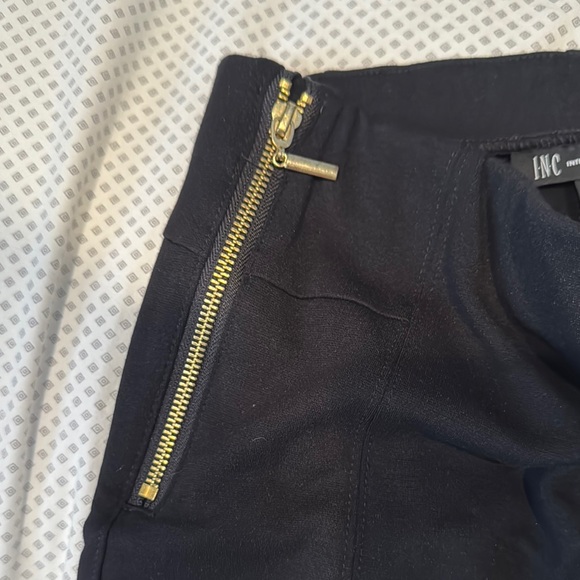 Like new INC black leggings size 4 Black Pants with Gold Zipper Accents - Picture 3 of 4